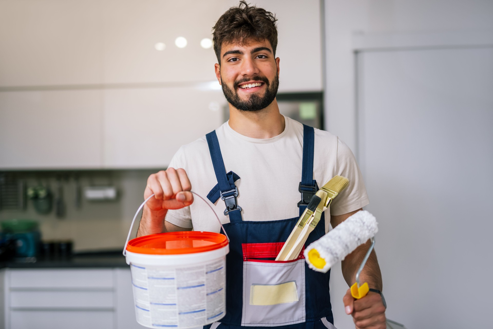 Painter Preparing to Paint Apartment Walls